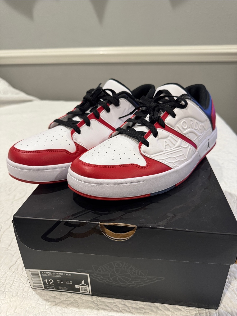 Jordan Nu Retro 1 Low Box Label in Black and White